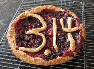By Evan Shelhamer (Pi Day Pie) [CC BY 2.0 (http://creativecommons.org/licenses/by/2.0)], via Wikimedia Commons